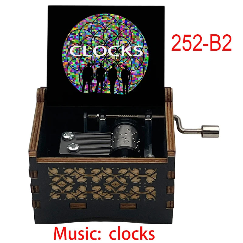 boîte musicale bois naturel motifs floraux 18 tons vintage manivelle horlogerie artisanale