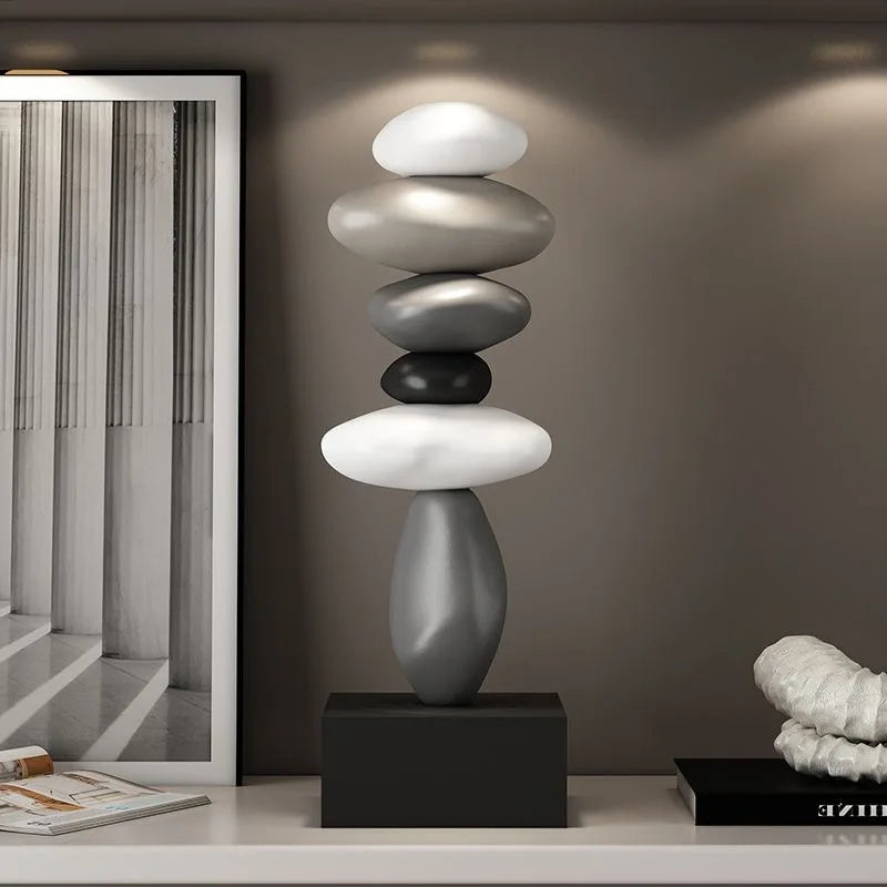 Sculpture moderne résine blanche gris noir lisse inspiration naturelle minimaliste base carrée noire