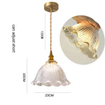 suspension lumineuse vintage vert doré motifs géométriques ampoules câbles chaînes métal