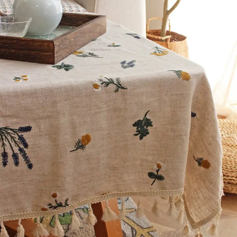 nappe coton brodée fleurs verte jaune violette rustique serviettes assorties tissage uni opaque salon