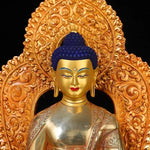 statue bouddha or bleu rouge relief orné tibétain traditionnel asiatique maison prière