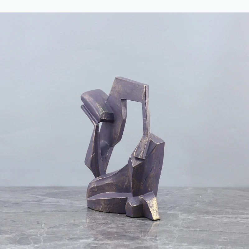 sculpture abstraite moderne gris foncé bronze texturée 23x17x6cm décoration angularité brute