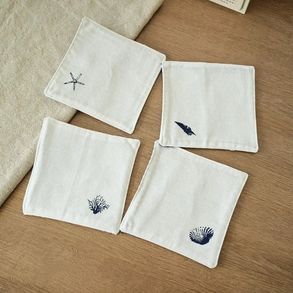 serviettes table classiques marin imprimées coquillages étoiles mer plumes géométriques blanc bleu marine