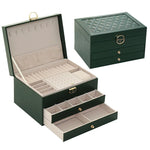 boîte rangement bijoux cuir motifs géométriques compartiments velours classique vert noir blanc rose chic