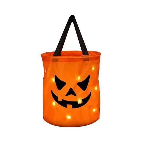 sac lumineux citrouille halloween orange noir motif yeux triangles LED enfants festif
