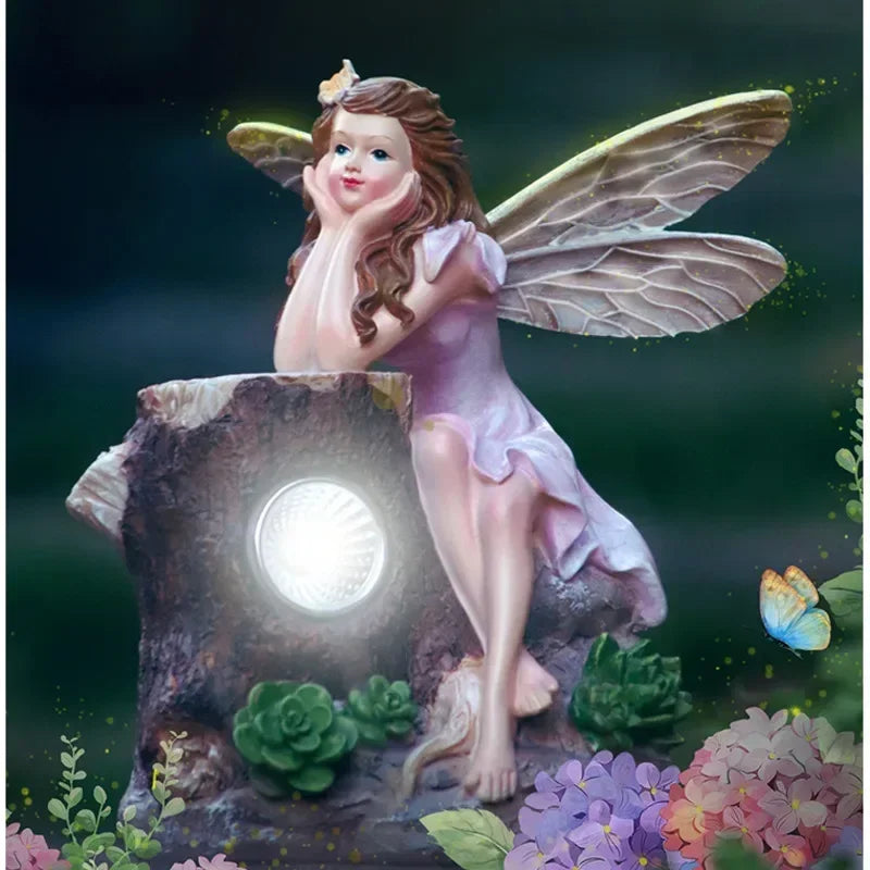 statuette féerique verte rouge blanc papillon champignon roche solaire nuit extérieur decoration cour