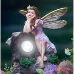 statuette féerique verte rouge blanc papillon champignon roche solaire nuit extérieur decoration cour