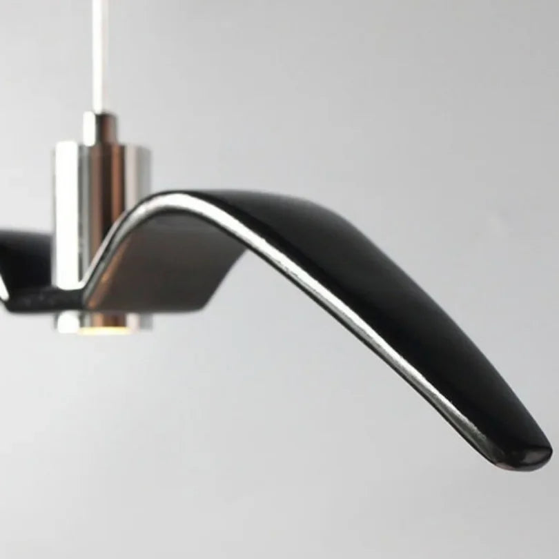 suspension lumineuse moderne oiseau stylisé blanc noir éclairage salon chambre led résine intérieur