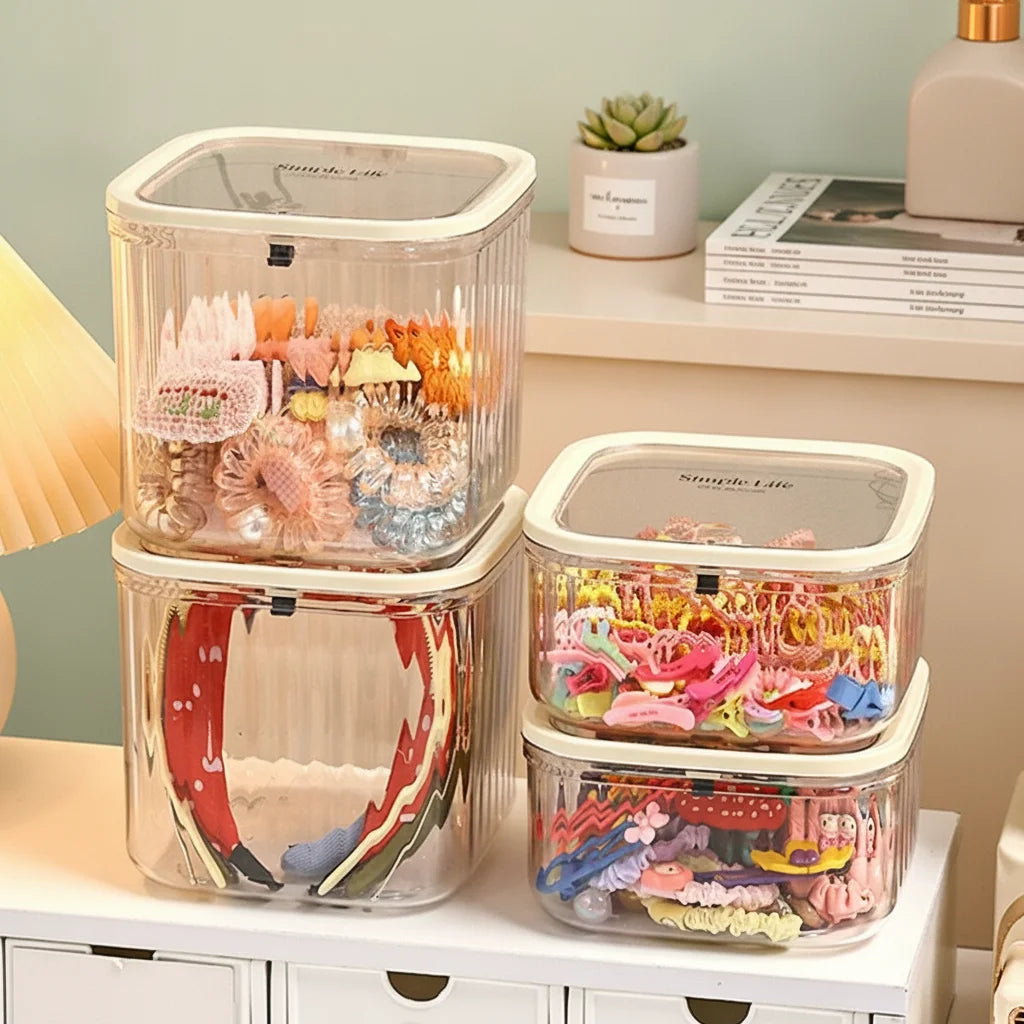 boîtes rangement accessoires cheveux transparentes poignées blanches rayures verticales moderne minimaliste femmes domestique