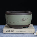 pots bonsaï porcelaine beige noir vert olive branches fleurs dessinées classique traditionnel