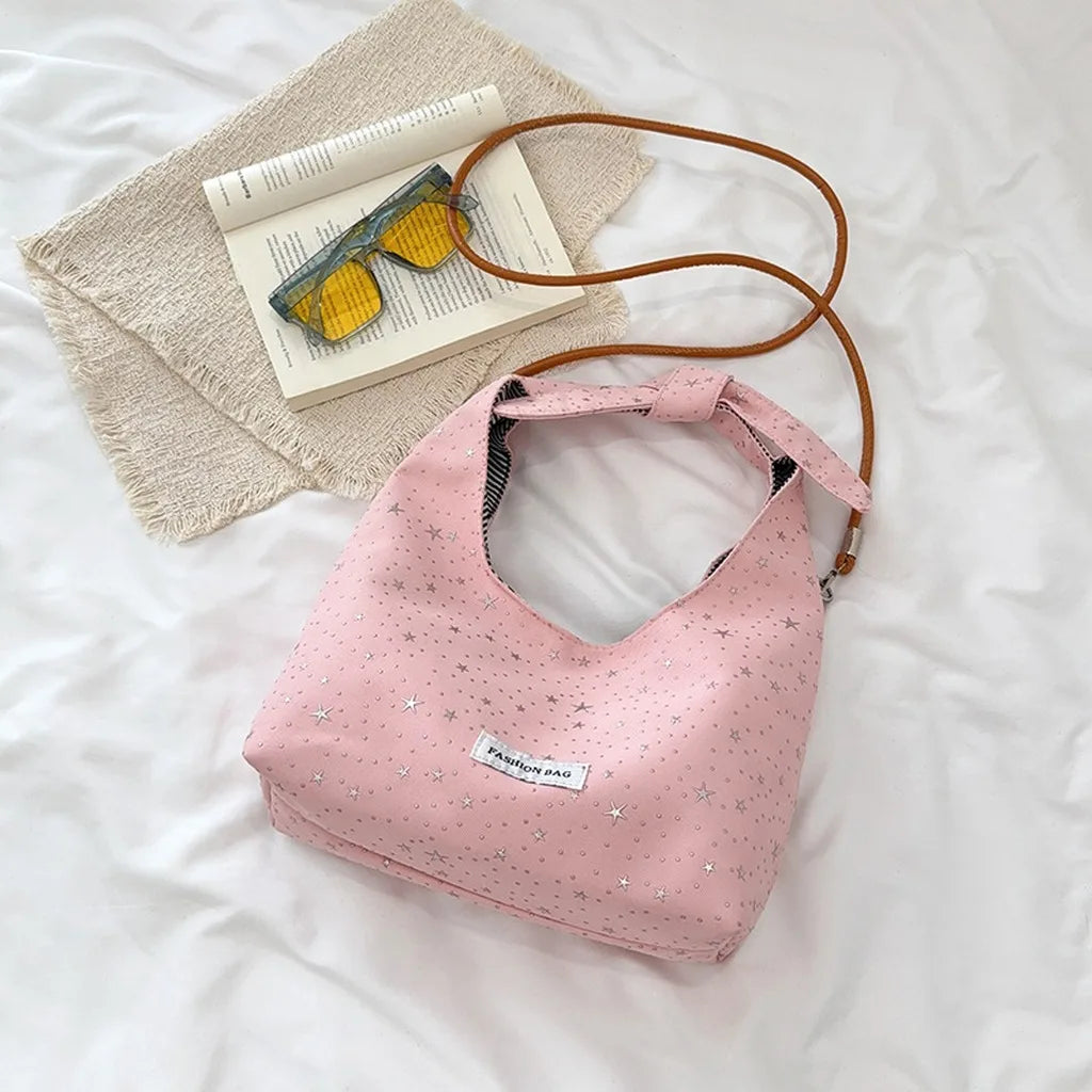 sac main femme rose clair étoiles dorées doux moderne casual tote toile