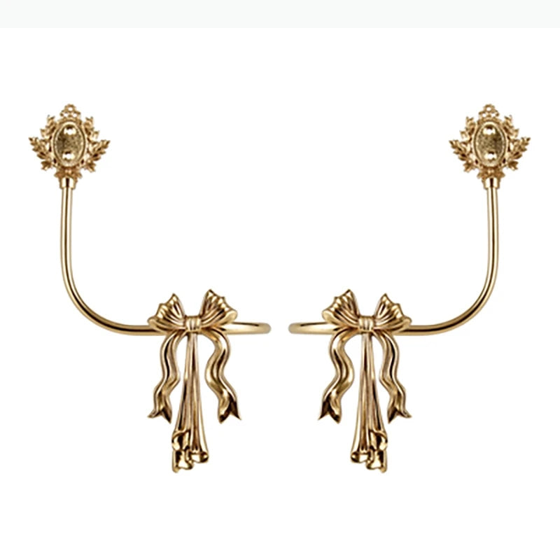 boucles rideau or ailes sculptées classiques décoratives noels dorés deux pièces