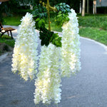 guirlande artificielle fleurs blanc vert feuilles vertes decoration mariage extérieur anniversaire baby shower