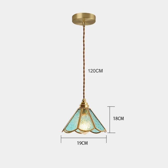 suspension lumineuse verre teinté art deco or marron bleu clair motifs géométriques opacité chaînes
