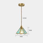 suspension lumineuse verre teinté art deco or marron bleu clair motifs géométriques opacité chaînes