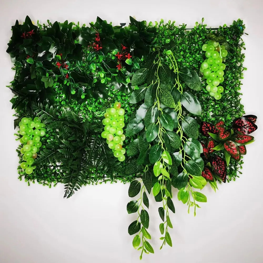 plantes artificielles vertes feuilles variées fruits rouges extérieures accrochées décoration naturelle maison exposition