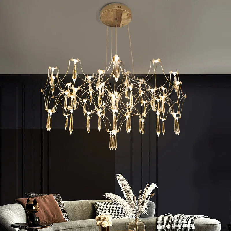 lustre moderne or cristaux transparents branches stylisées salon chambre principale