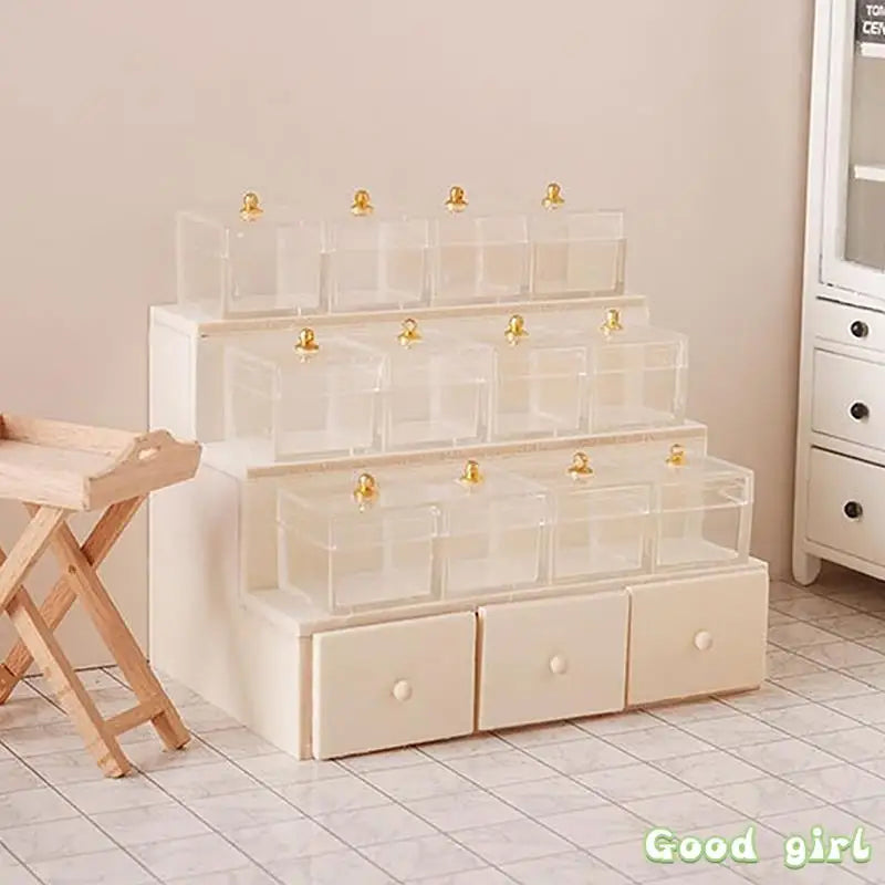 meuble decoratif miniature blanc crème tiroirs transparents objets fantaisie sci fi