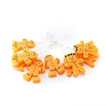 guirlande lumineuse noël père noël souriant orange noeuds papillons led festif