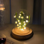 bouquet lumineux fleurs cloche verre blanc vert base bois moderne décoration intérieure saint valentin