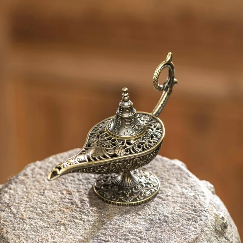 lampe huile bronze ornements floraux ancien oriental décoratif gravures