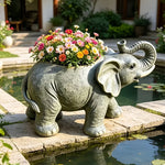 pot fleurs forme éléphant gris texture éléphant plantes fleurs vert rose rouge jaune blanc