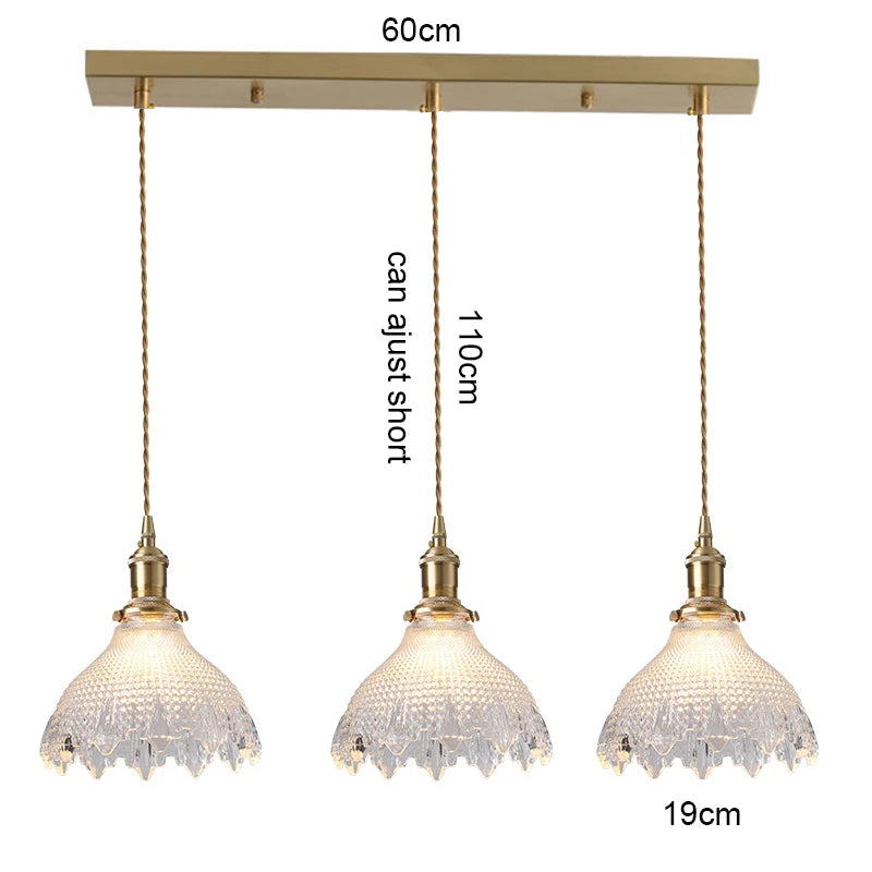 suspension lumineuse vintage vert doré motifs géométriques ampoules câbles chaînes métal