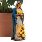 statue religieuse bleu blanc doré robe ornée roses classique extérieur jardin patio