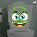 stickers toilette visage souriant yeux grands ouverts cartoon lumineux adhésifs salle bain bleu blanc