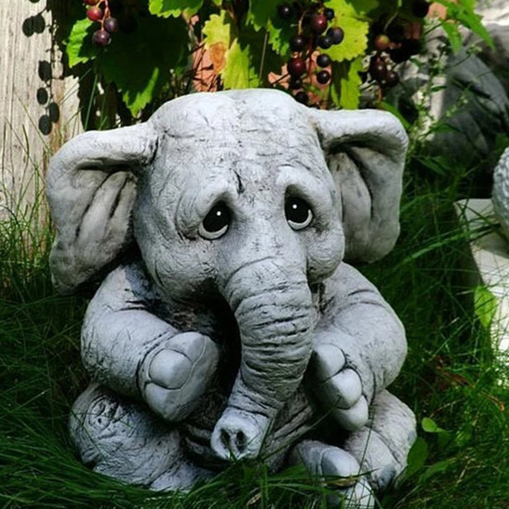 statue éléphant gris blanc décoratif jardin animalier texturé extérieur triste expressioniauxenfantin herbe vigne