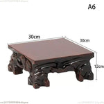support bois sculpté motifs floraux artisanal miniature collection marron foncé