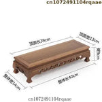 support bois sculpté table basse vase plantes traditionnel asiatique trépied