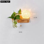 lampe murale scandinave bois naturel feuilles vertes plante boule lumineuse chaîne éclairage chambre salon