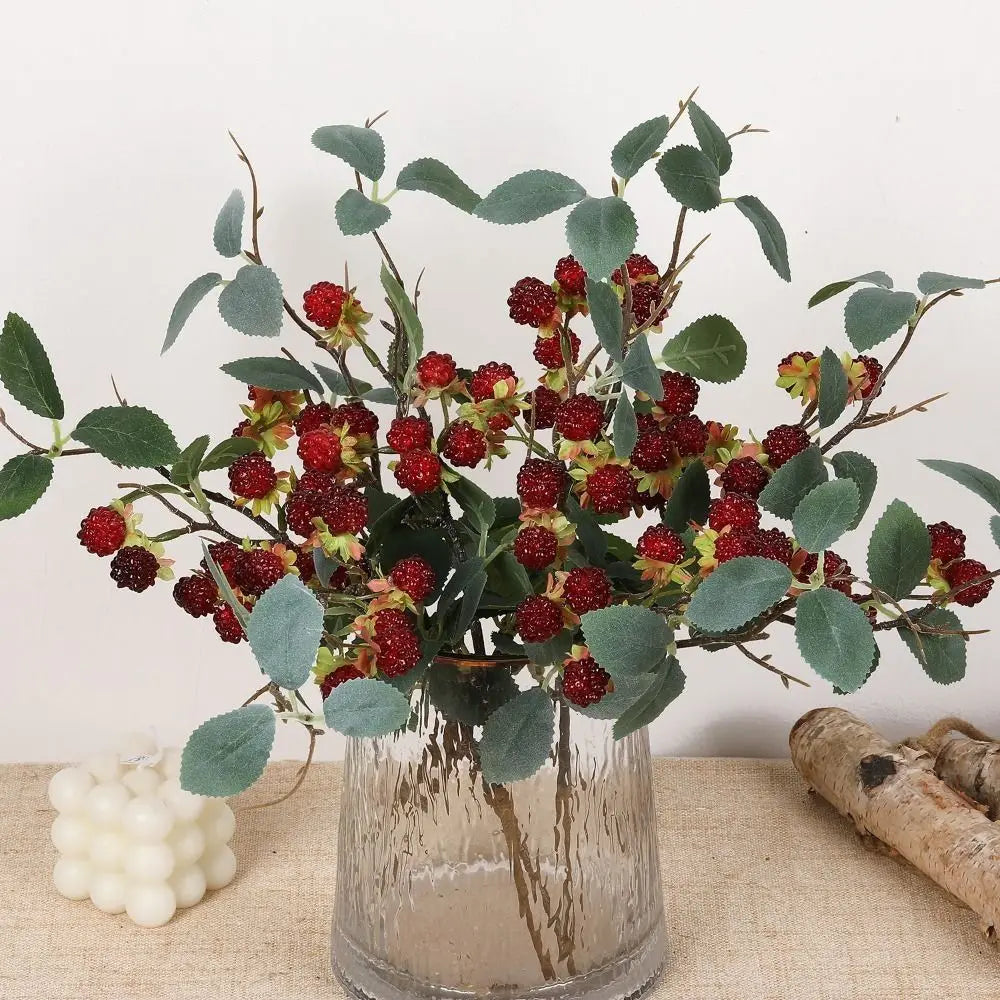décoration intérieure bouquets branches baies rouges feuilles vertes artificielles naturelles occasion fête maison