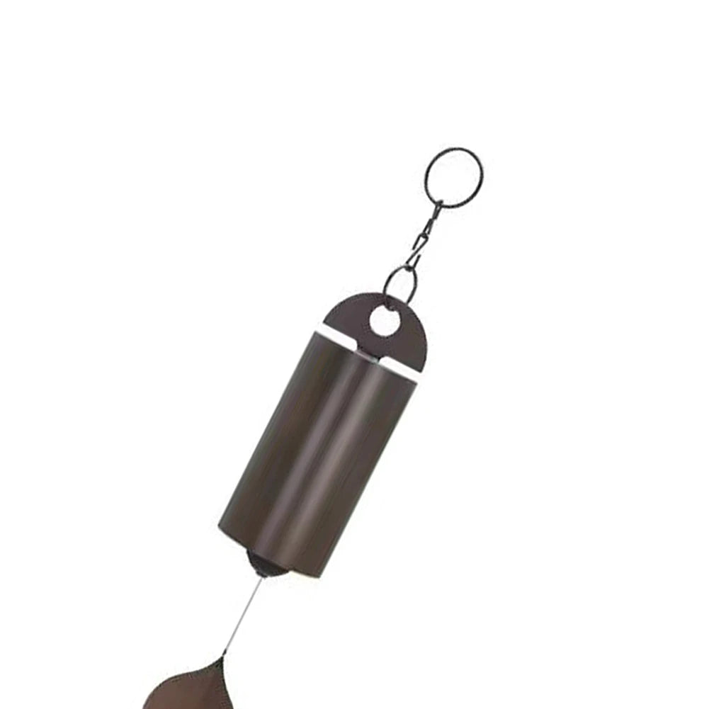 sonaille éolienne cloche vent marron feuille verte rustique nature minimalisteextérieur forêt lac neige