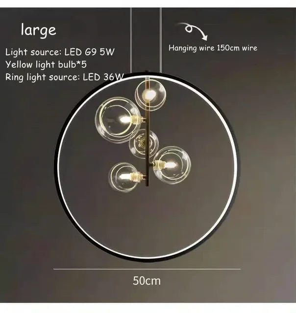 lumière suspendue moderne pendentif géométrique transparent cercles métalliques dorés chambre salon