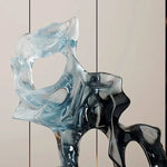 sculpture décorative abstraite moderne bleu clair noir transparent lumière reflétée living room ambiance chambre