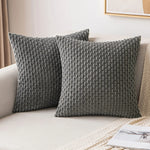 coussins carrés vert clair beige rose pâle texture tissée pompons moderne fermeture glissière