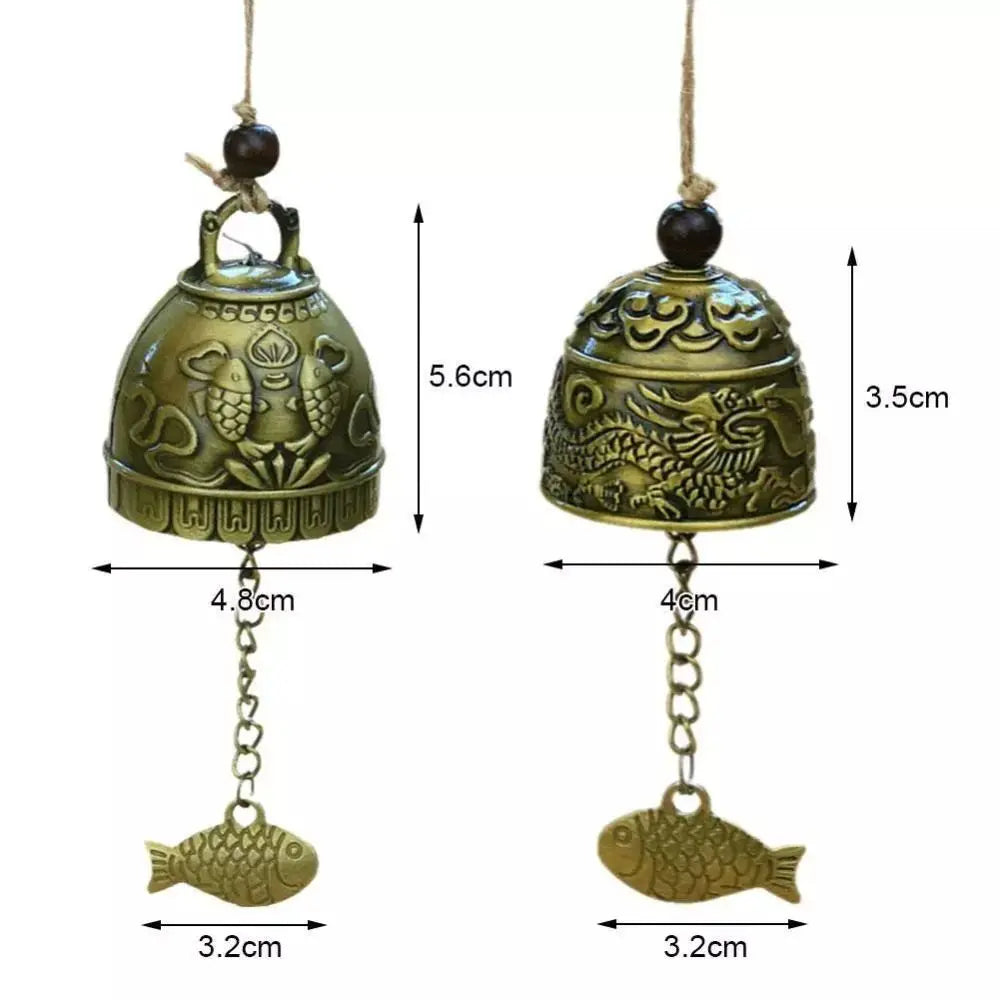 cloche décorative artisanale bronze doré ornements floraux poissons vintage pendentif métallique