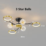 lampe suspendue moderne boules translucides noires dorées blanches étoiles salon chambre coucher decoration