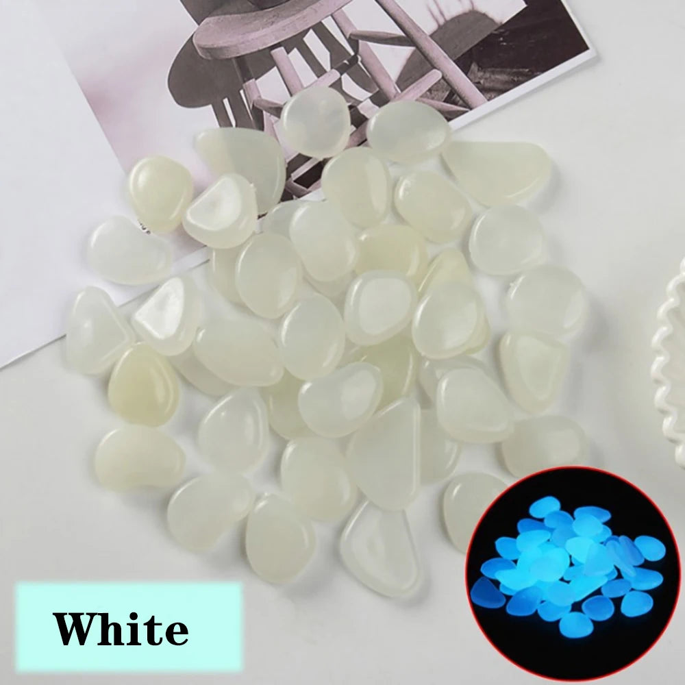 pierres fluorescentes bleu vert jaune rose modernes lisses jardin patio décor lumineux
