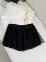 jupe élastique minijupe dessus genou élégante tulle noir blanc féminine chic translucide boutons