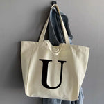 sac main femme toile beige clair lettre noire poignées détachables