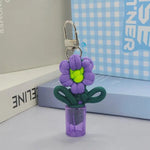 porte clés fleur tridimensionnelle couleurs vives boucle métallique créatif artisanal transparent opaque