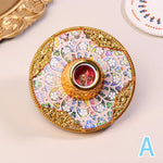 support lampe ornemental baroque or argent rouge ornements floraux motifs géométriques opaques
