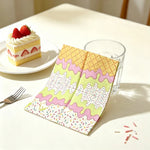 serviettes papier motifs desserts pliées rose vert jaune blanc festives anniversaire enfants transparentes