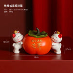 statue chat porte bonheur blanc doré artisanal détails dorés pochette rouge plateau texte rouge