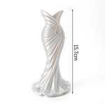 vase décoratif moderne minimaliste motif ondulé spirale opaque fleurs lilas violet table maison salon