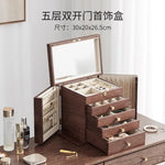 coffret bijoux bois marron tiroirs poignées dorées rangement moderne minimaliste
