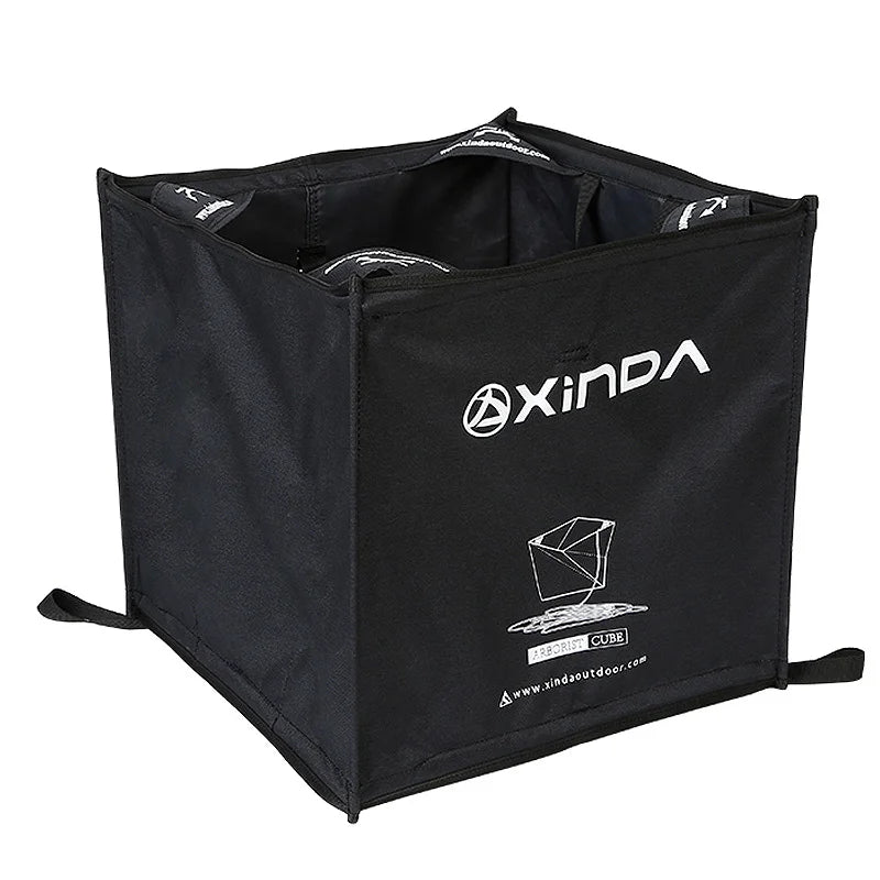 sac pliable rangement cube noir orange tissu texturé outdoor compact echangement velcro